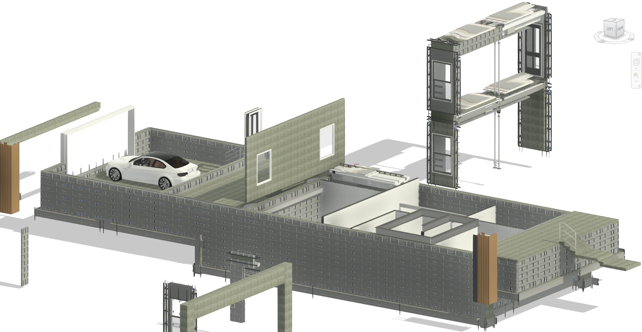 CTBS jobsite model — forming panels up, tie spikes along the pour, AAC-framed openings, stacked panel assemblies